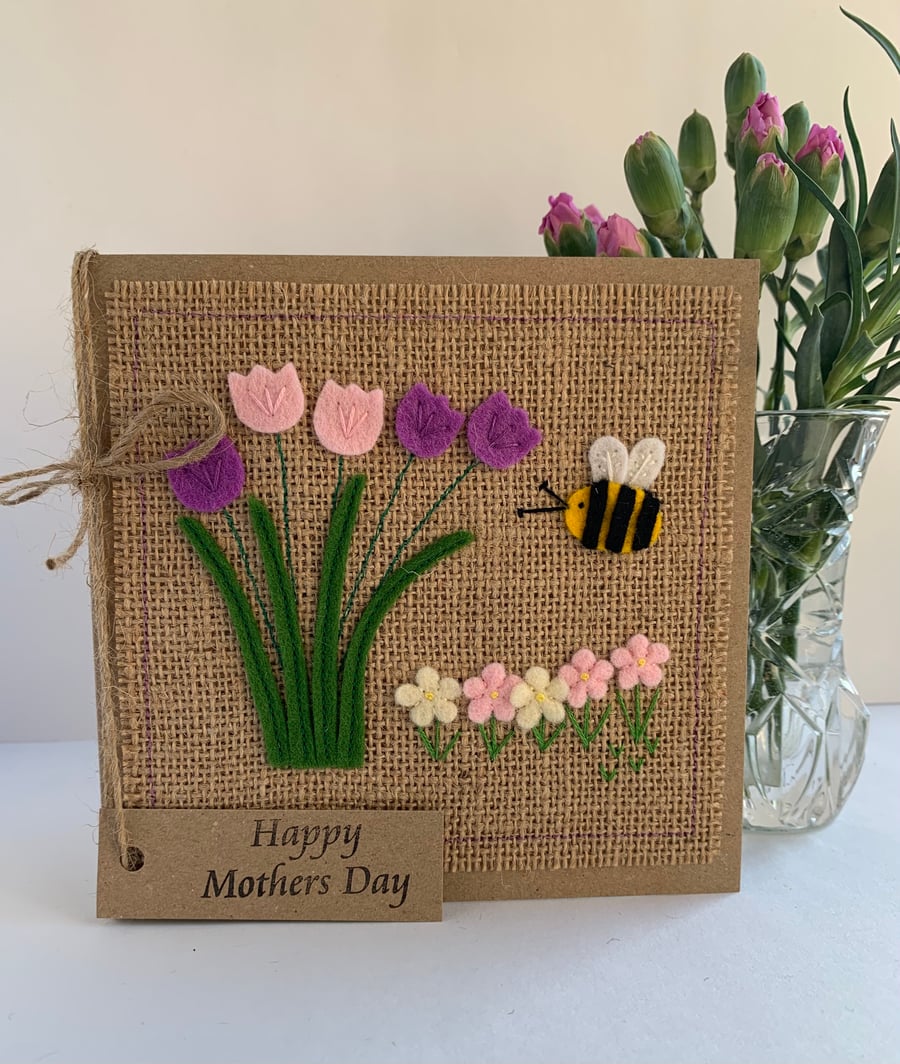 Handmade Mother’s Day Card. Purple and pale pink flowers from wool felt. 
