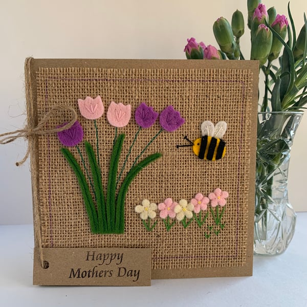 Handmade Mother’s Day Card. Purple and pale pink flowers from wool felt. 