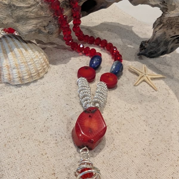 Red Bamboo Coral Pendant complimented by wire wrapped beads