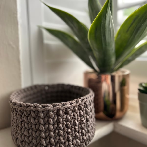 Handmade crochet knitted basket with wooden base