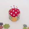 ceramic pincushion with flower button