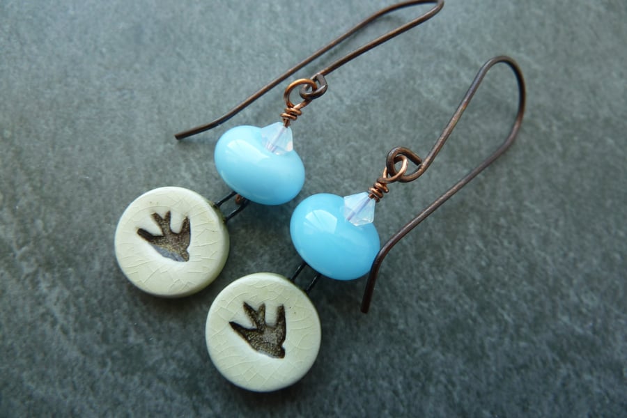 copper, blue lampwork and ceramic swallow earrings