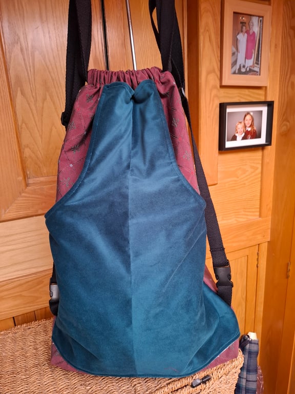 Maroon brocade backpack