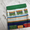 Reusable sandwich bag with food safe lining. Trains fabric