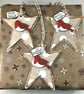 Handmade star shaped Christmas gift tags with robins