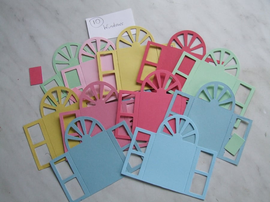 20 door or window shaped Sizzix die cuts for card embellishments & crafting.