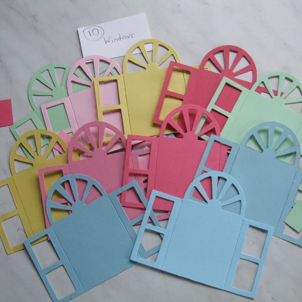 20 door or window shaped Sizzix die cuts for card embellishments & crafting.