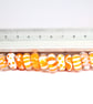 Handmade orange and white patterned lamp work glass beads - Image 6