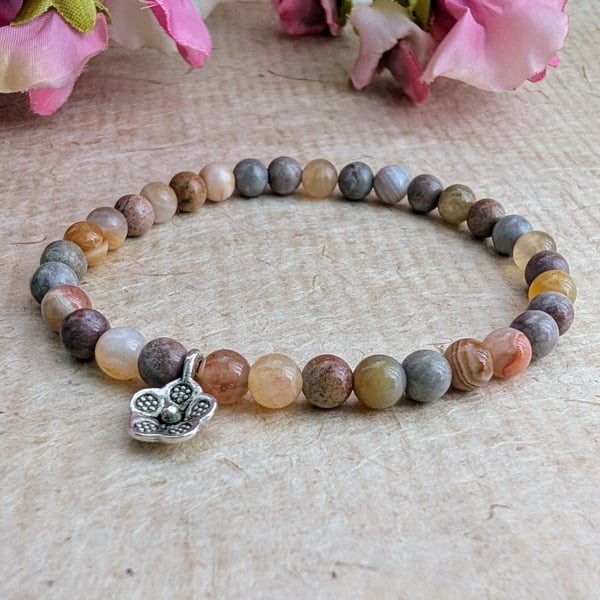 Porcelain jasper and Botswana agate elastic bracelet with flower charm 