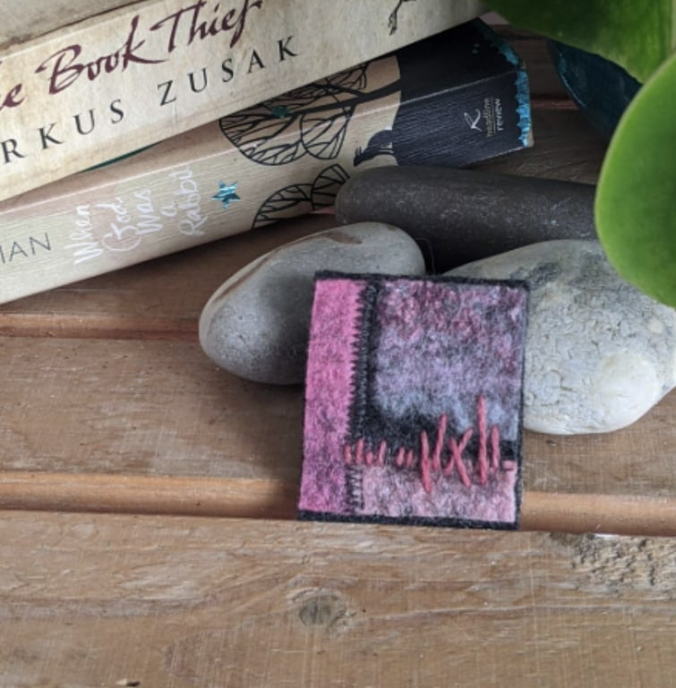 Felted patchwork brooch in shades of pink and grey