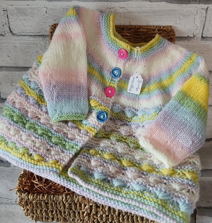 Handknitted baby cardigan.  Approx  3 to 6 mths.  Price includes P and P.. 
