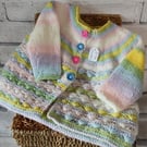 Handknitted baby cardigan.  Approx  3 to 6 mths.  Price includes P and P.. 