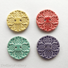 Set of four ceramic handmade buttons
