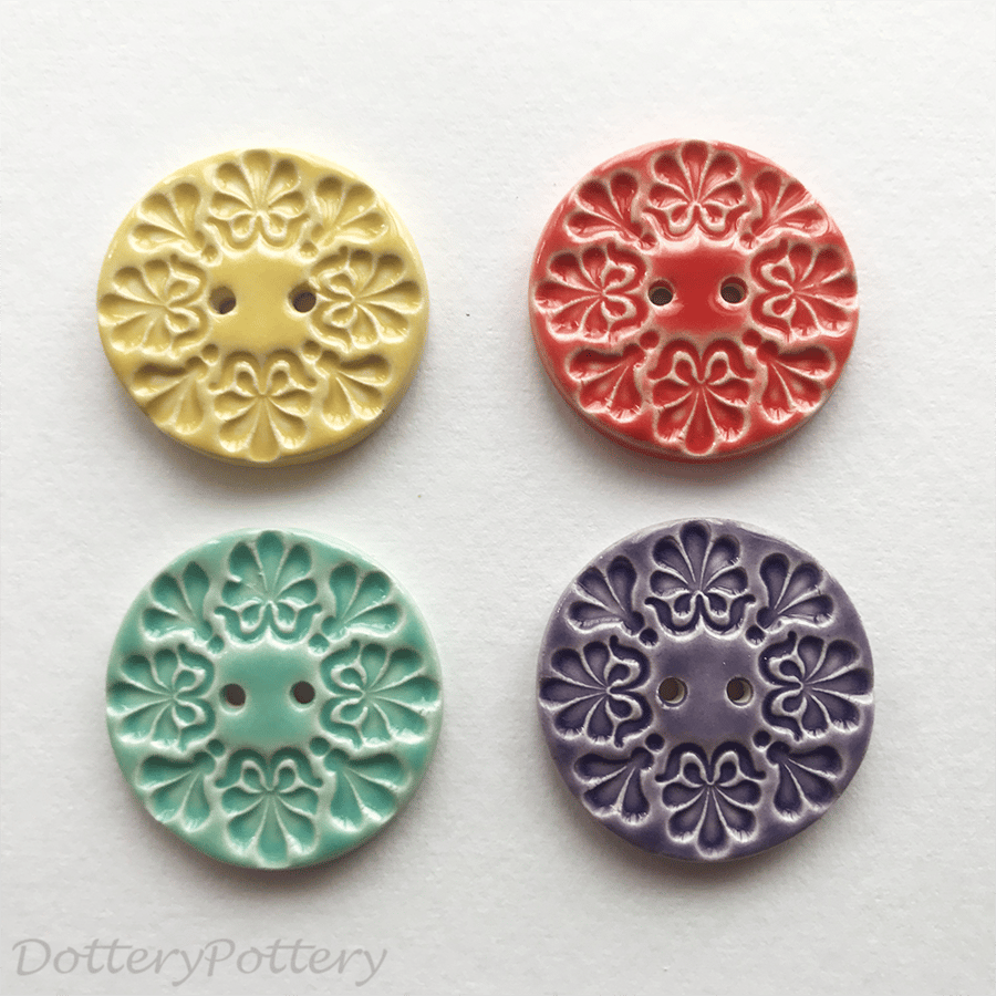 Set of four ceramic handmade buttons