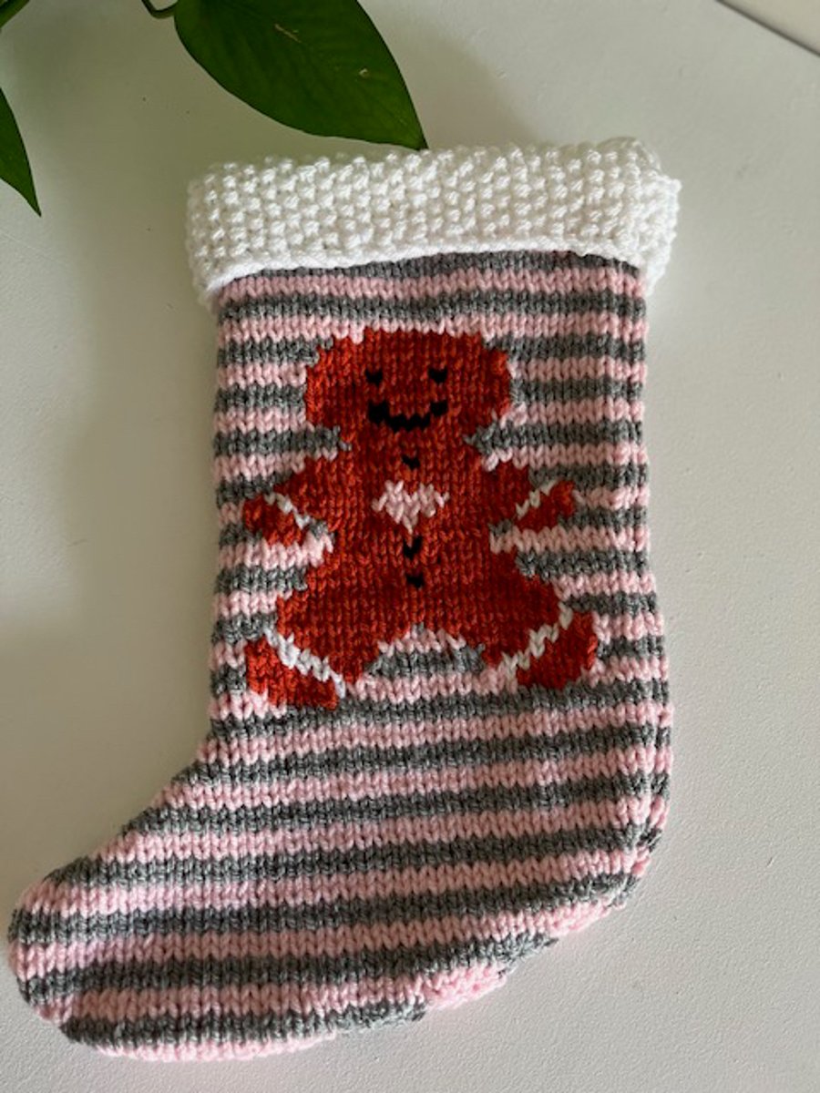 Hand knitted  pink gingerbread man  christmas stocking