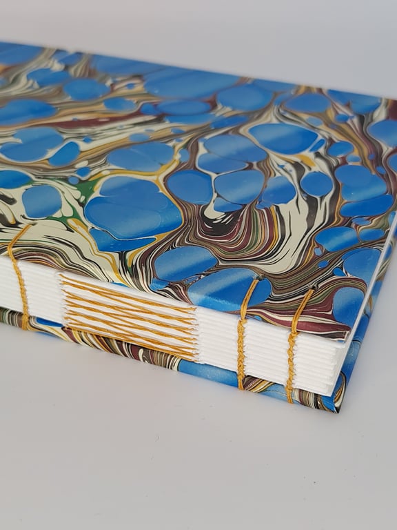 Handcrafted A6 coptic stitch notebook with recycled paper