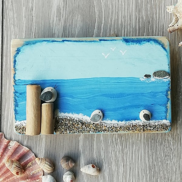 Pebble seagulls with driftwood groynes on palletwood plaques 