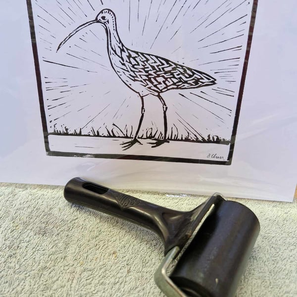 Curlew A4 hand printed lino print. Black and white.