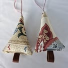 Pair of hand crafted fabric christmas tree decorations with leather trunk
