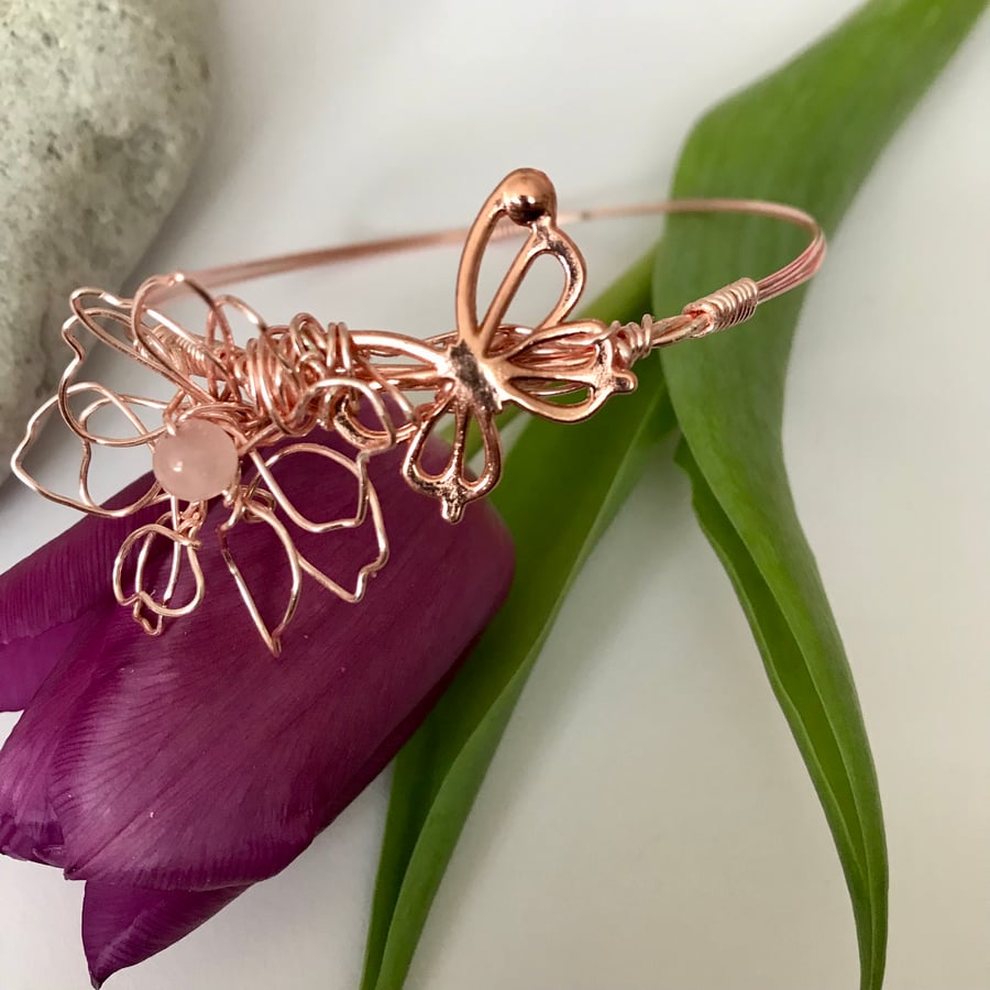 Bangle in Rose Gold with A Butterly and Flower 