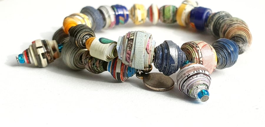 Multicoloured unique memory wire bracelet made with a selection of paper beads