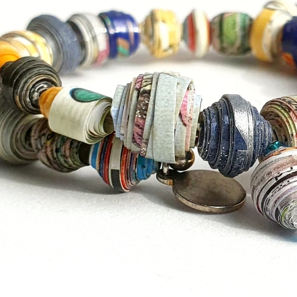 Multicoloured unique memory wire bracelet made with a selection of paper beads