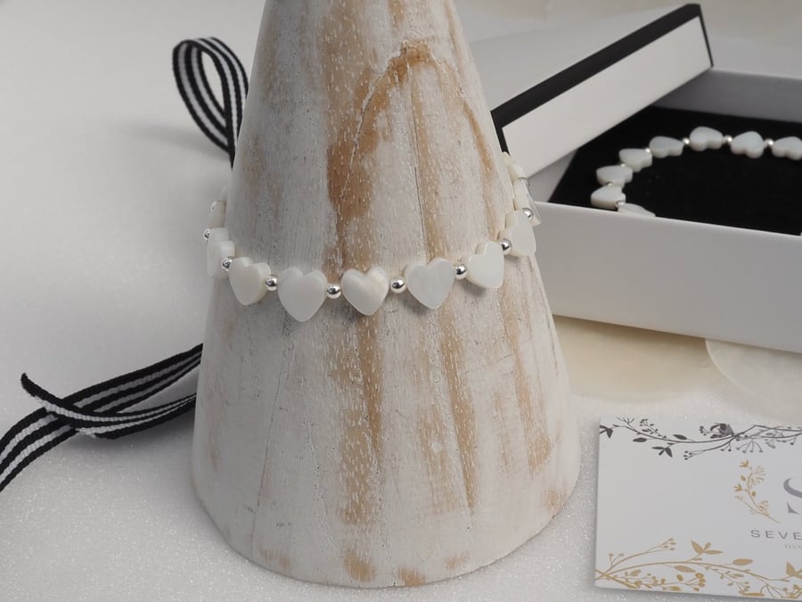Mother of pearl hearts stretch bracelet with sterling silver beads