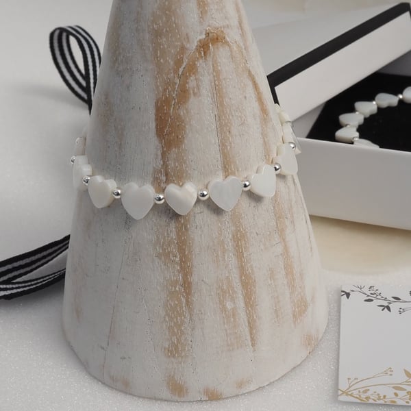 Mother of pearl hearts stretch bracelet with sterling silver beads