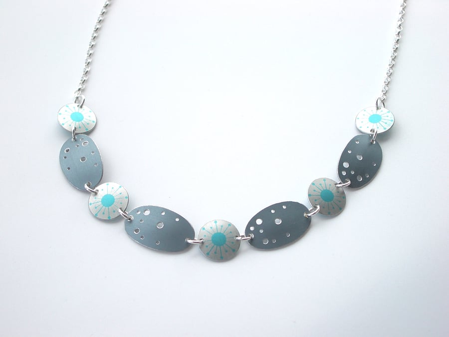 Turquoise and silver starburst necklace with grey speckled ovals 