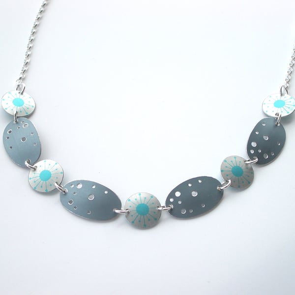 Turquoise and silver starburst necklace with grey speckled ovals 