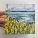 Seascape with grasses and plants printed card. 