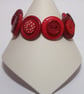 Red button bracelet - Image 2
