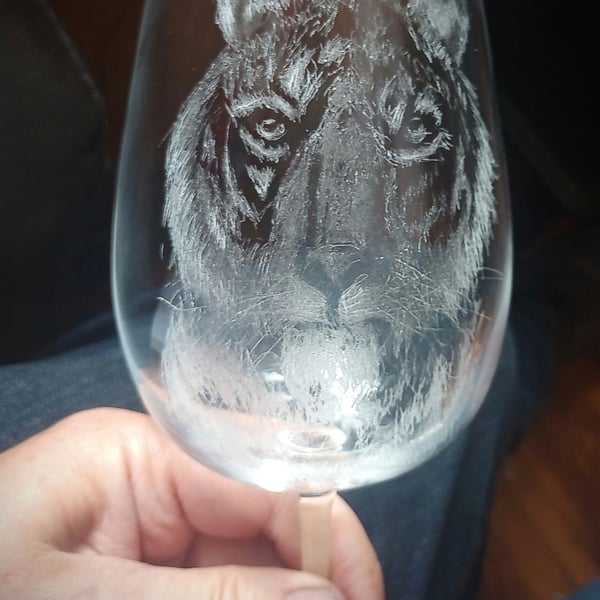 Tiger on a wineglass