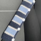 CAR SEATBELT  sleeve ( padded ) . Alpaca blend. Blues , stripes.