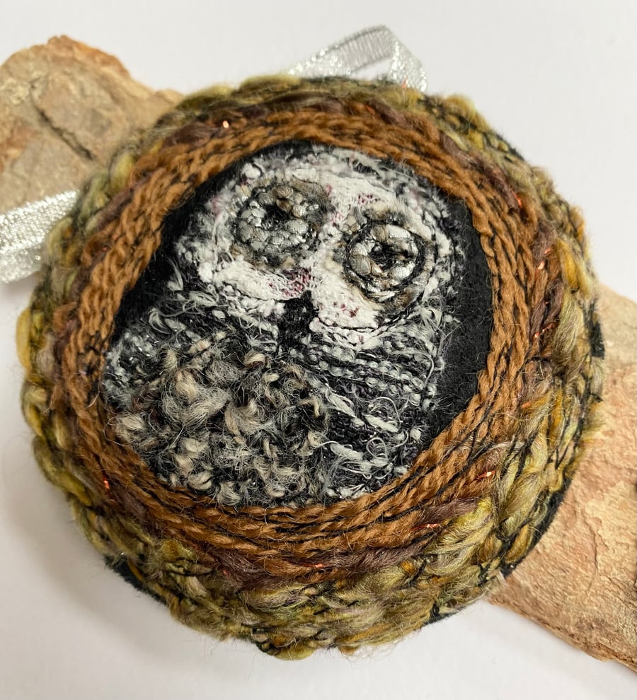 Upcycled embroidered owl in a tree home decoration. 