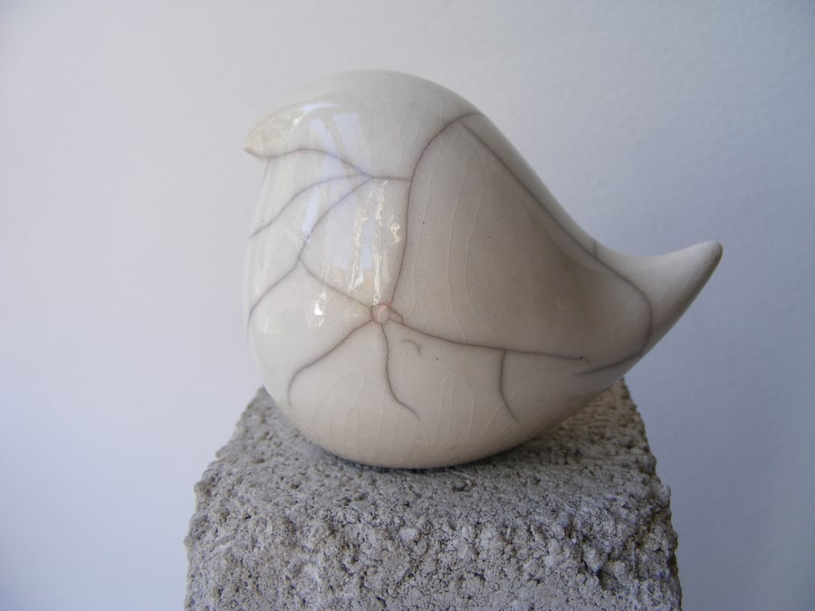 Raku glazed round bird