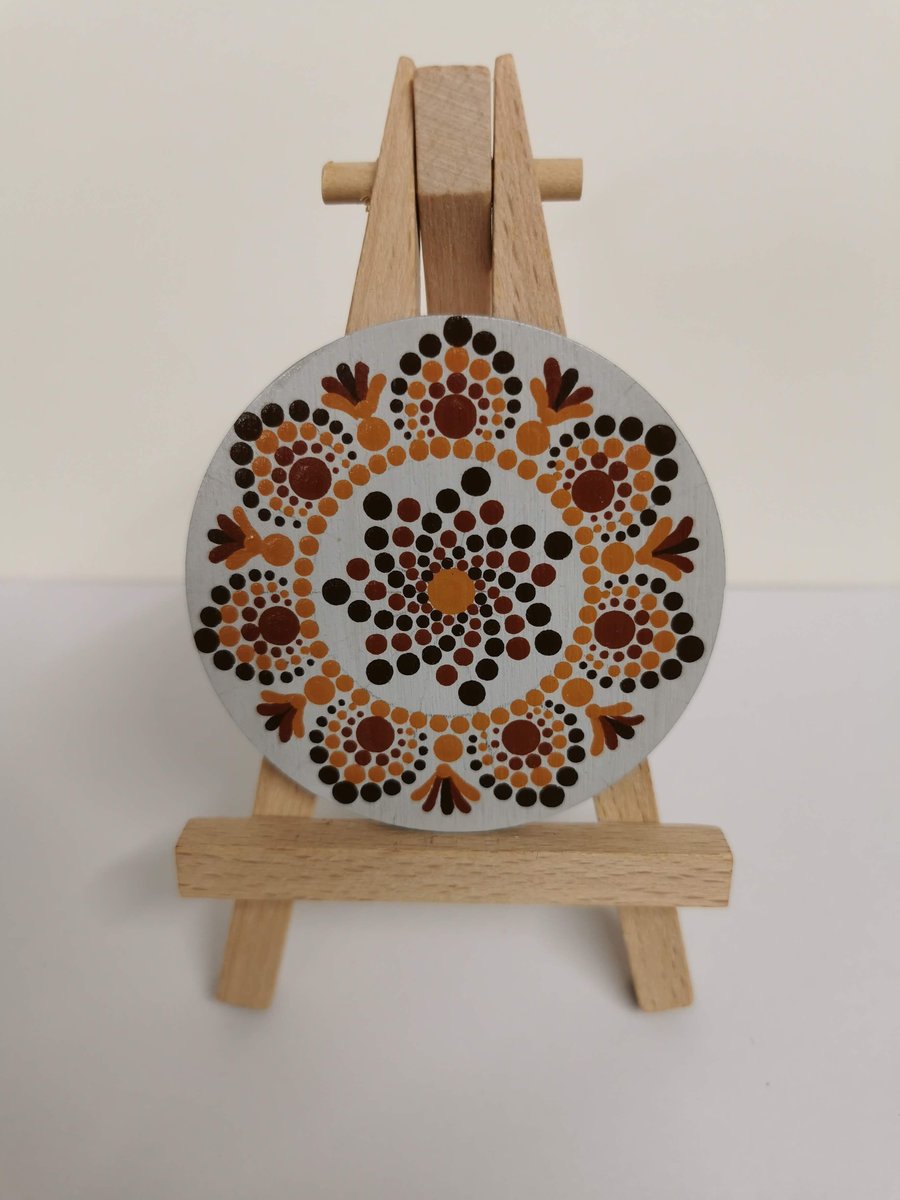 Hand painted orange and black mandala magnet