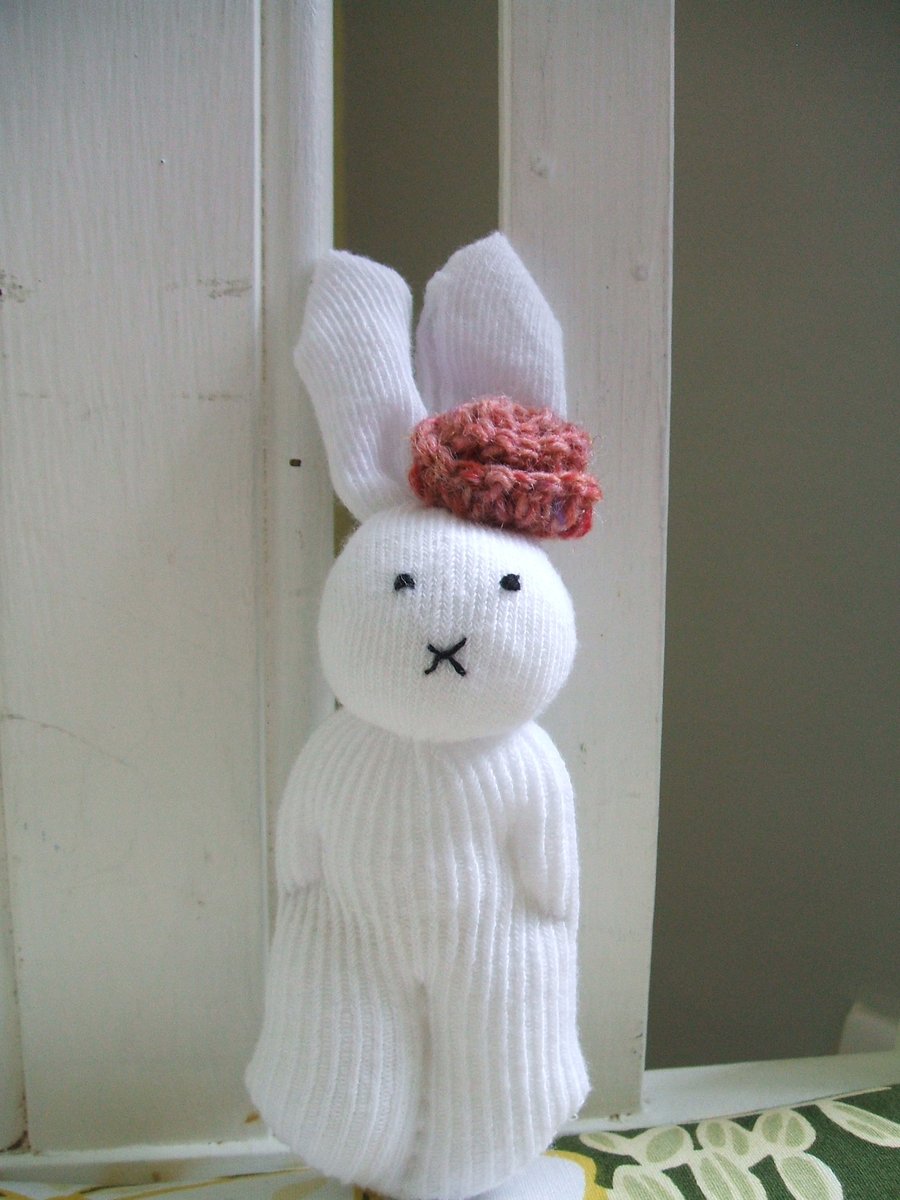 Cute bunny soft toy with red flower