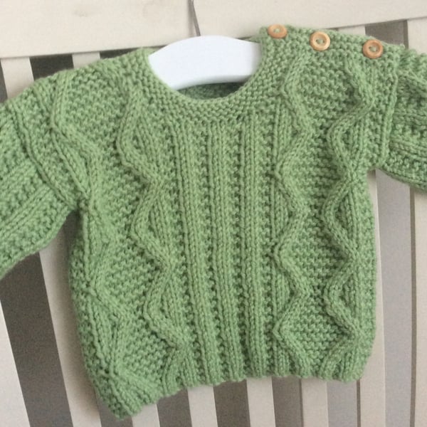 Hand knitted Aran baby jumper 