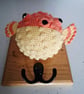 Crocheted puffer fish head on wooden board with hooks - Image 2