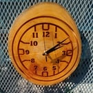 Handcrafted pine wall clock with quartz movement.