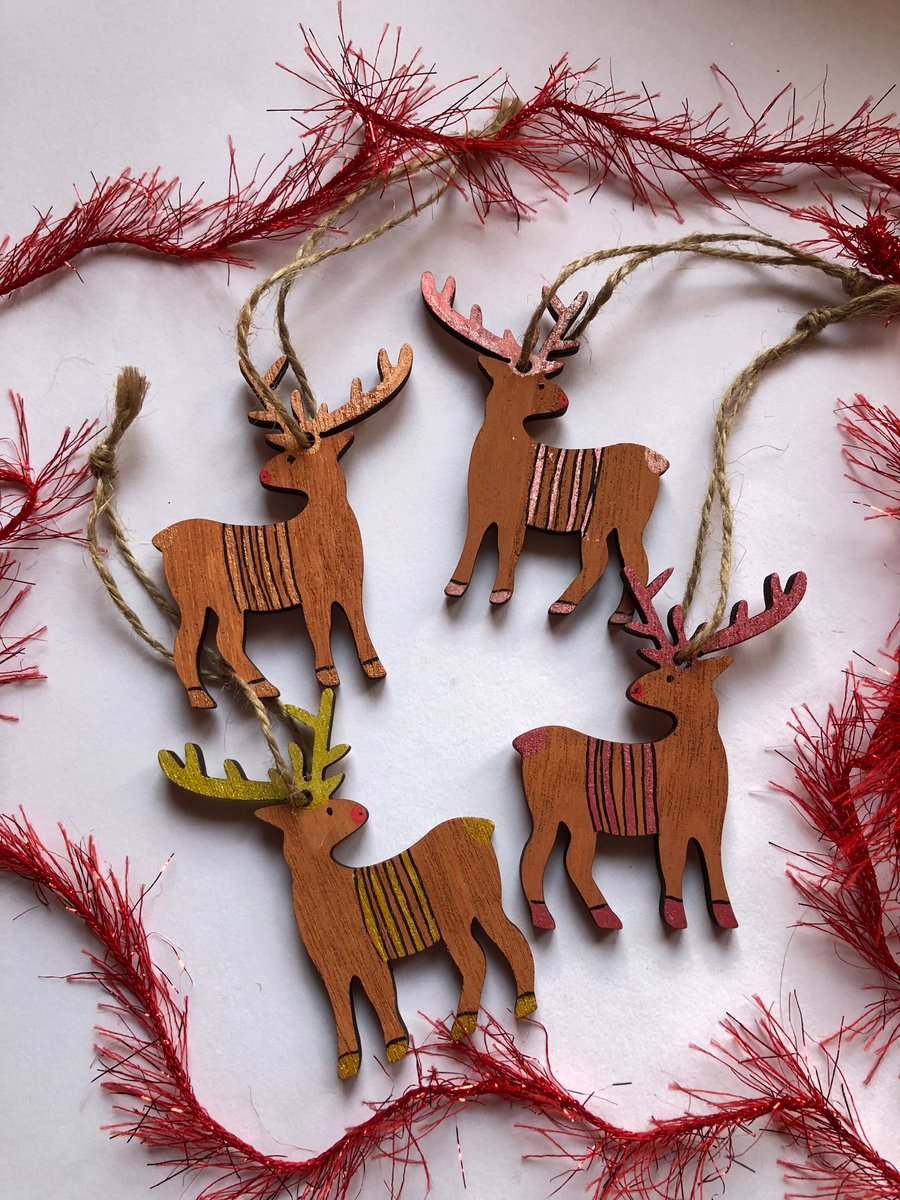 4 reindeer tree ornaments 