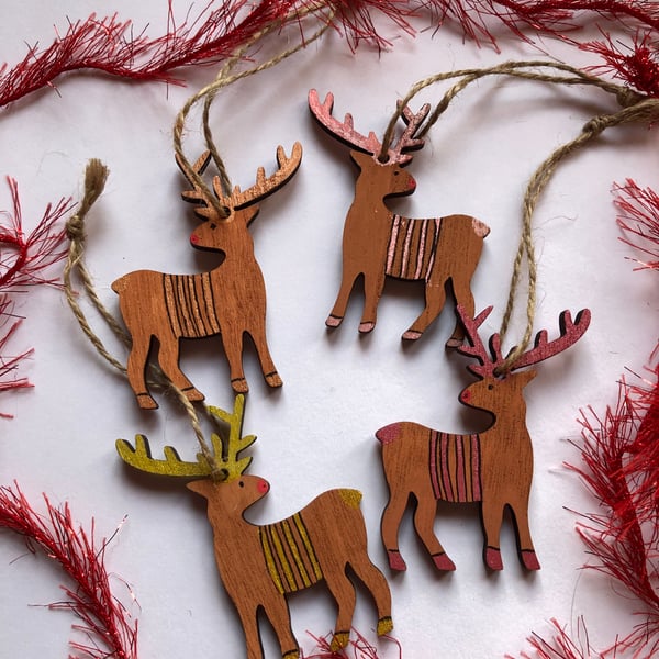 4 reindeer tree ornaments 