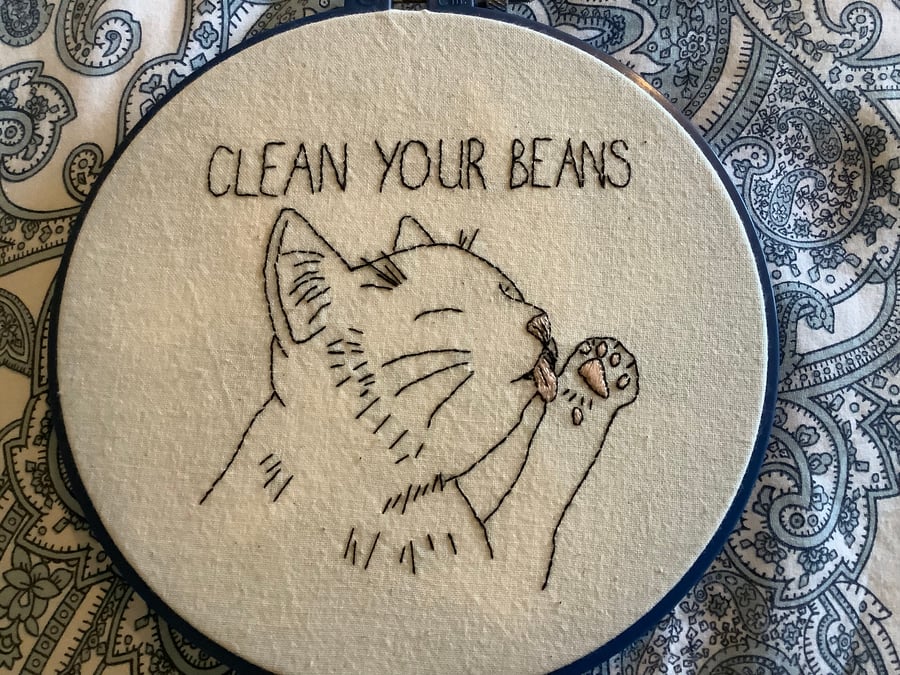 Hand embroidered cat.