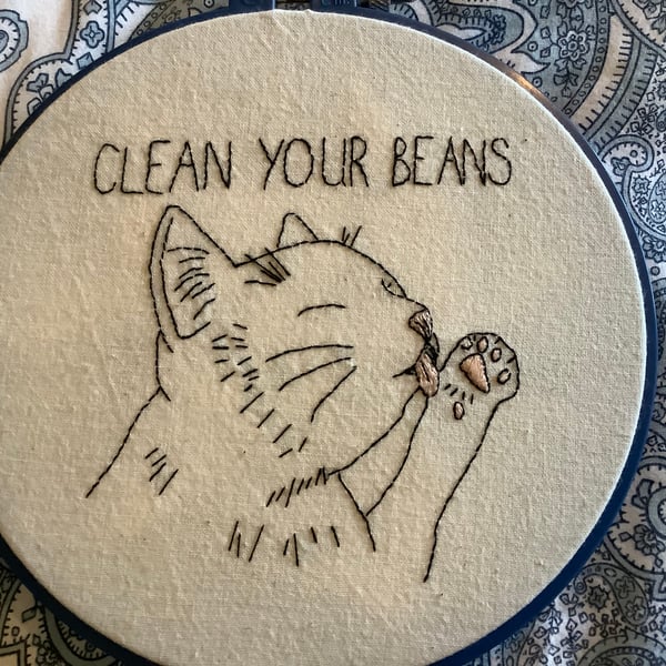 Hand embroidered cat.