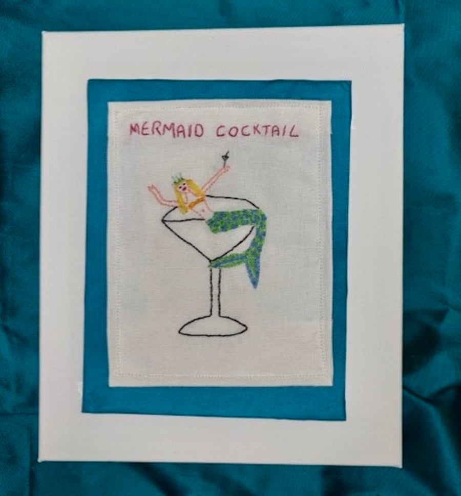 Mermaid cocktail hand embroidered picture.