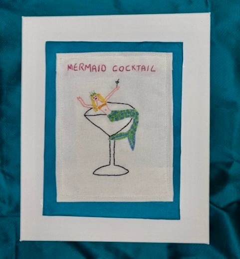 Mermaid cocktail hand embroidered picture.
