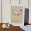 Hand-stitched mini bunting, little white doves, pretty card to keep!