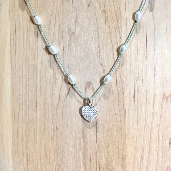 Heart silver and cubic zirconia crystal pendant threaded with Freshwater pearls