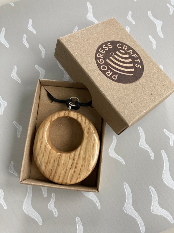 Light oak circular pendant